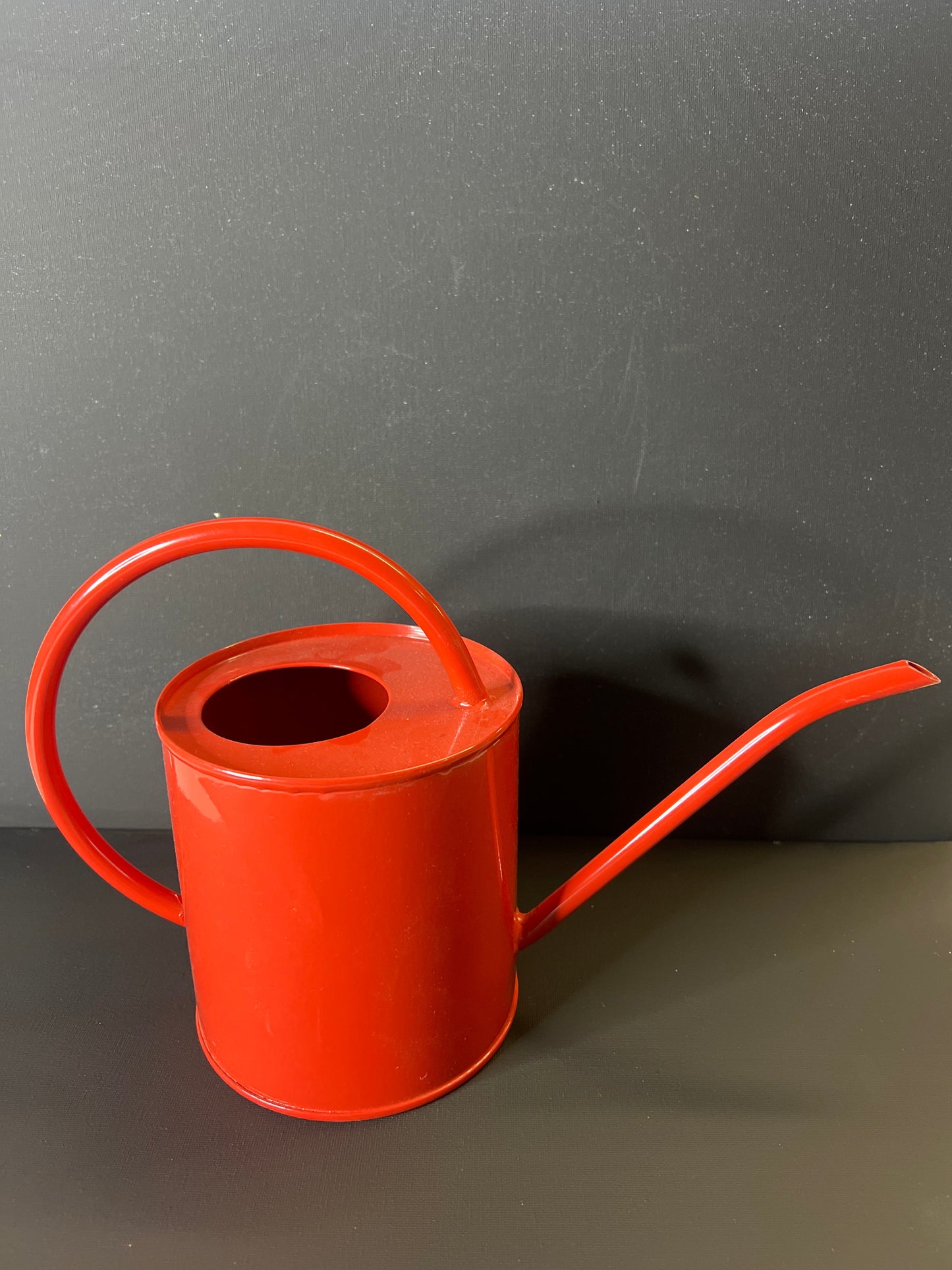 red watering can